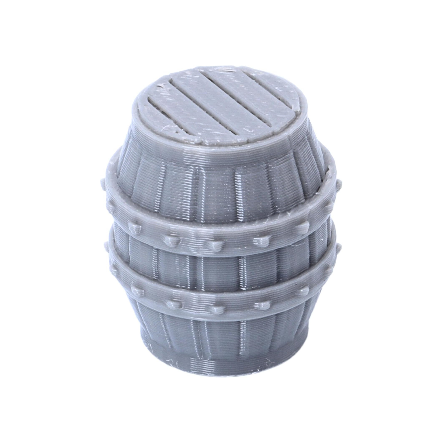 Angled close-up of an unpainted resin barrel terrain piece