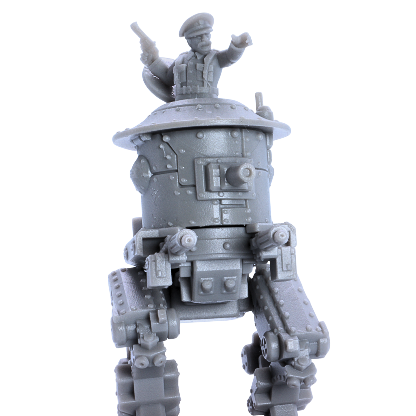 Close-up of the unpainted British MK1 Sentinel Heavy Tank miniature showing riveted armor, front cannon, and commander figure.