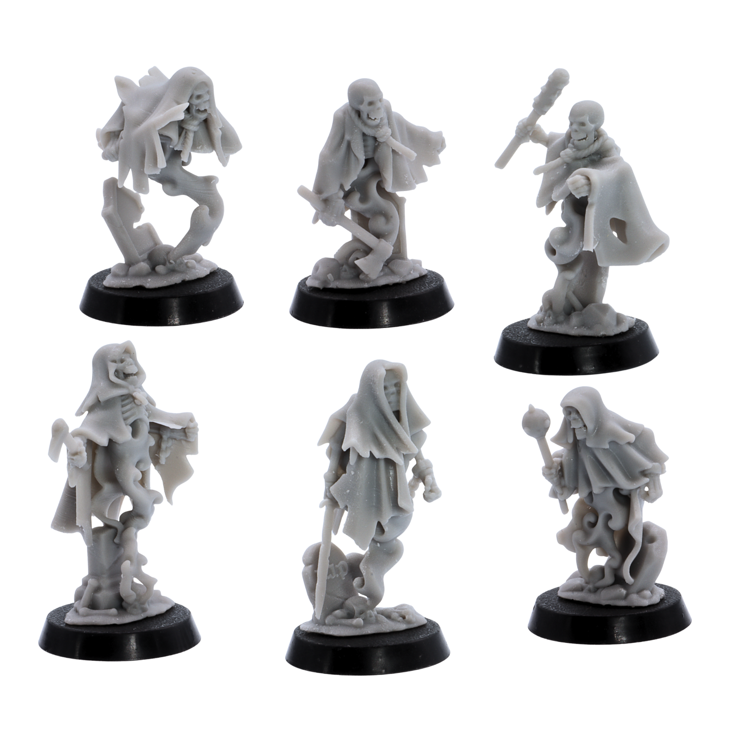 Unpainted Crypt Ghost miniatures showing six varied undead spirit poses with skeletal faces, torn cloaks, weapons, and spectral bodies.