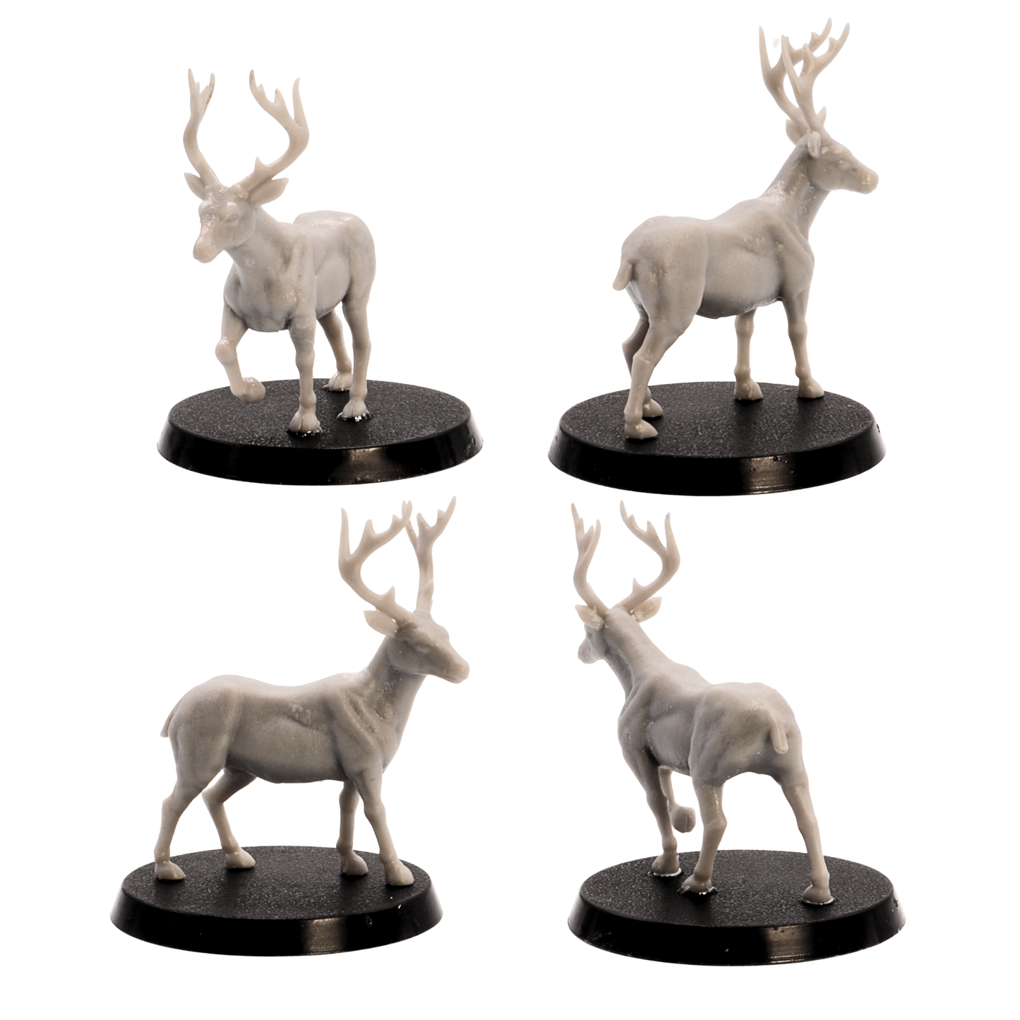 Unpainted deer and stag miniatures from the Forest Animals set shown from multiple angles on round bases.