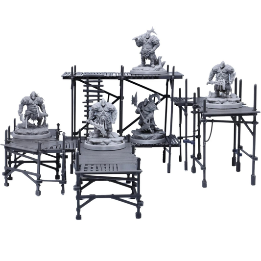 Modular scaffolding terrain shown with fantasy miniatures for scale, arranged as a multi-level tabletop encounter scene.