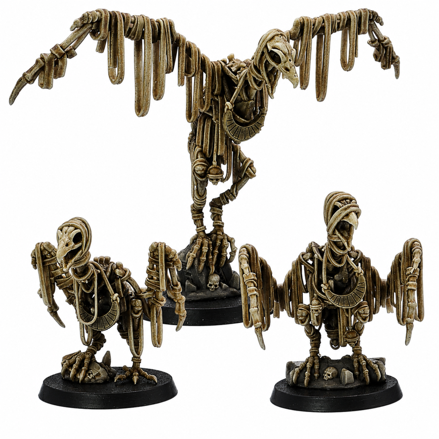 Painted Egyptian Vulture miniature set of three by Highlands Miniatures, showing skeletal bird creatures with wrapped details and ancient ornaments.