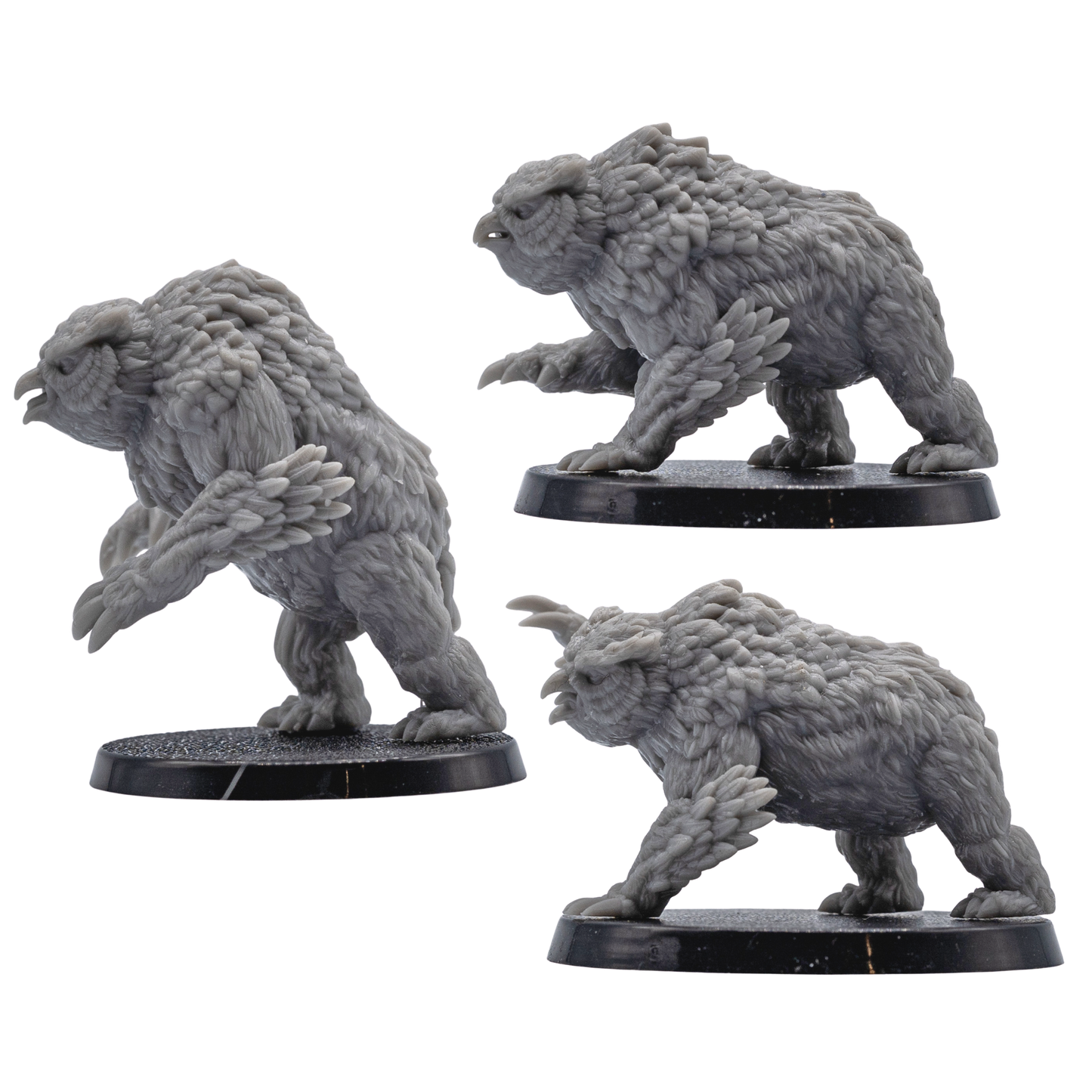 Profile views of three unpainted Owlbear miniatures by Forged Path Miniatures for fantasy tabletop encounters.