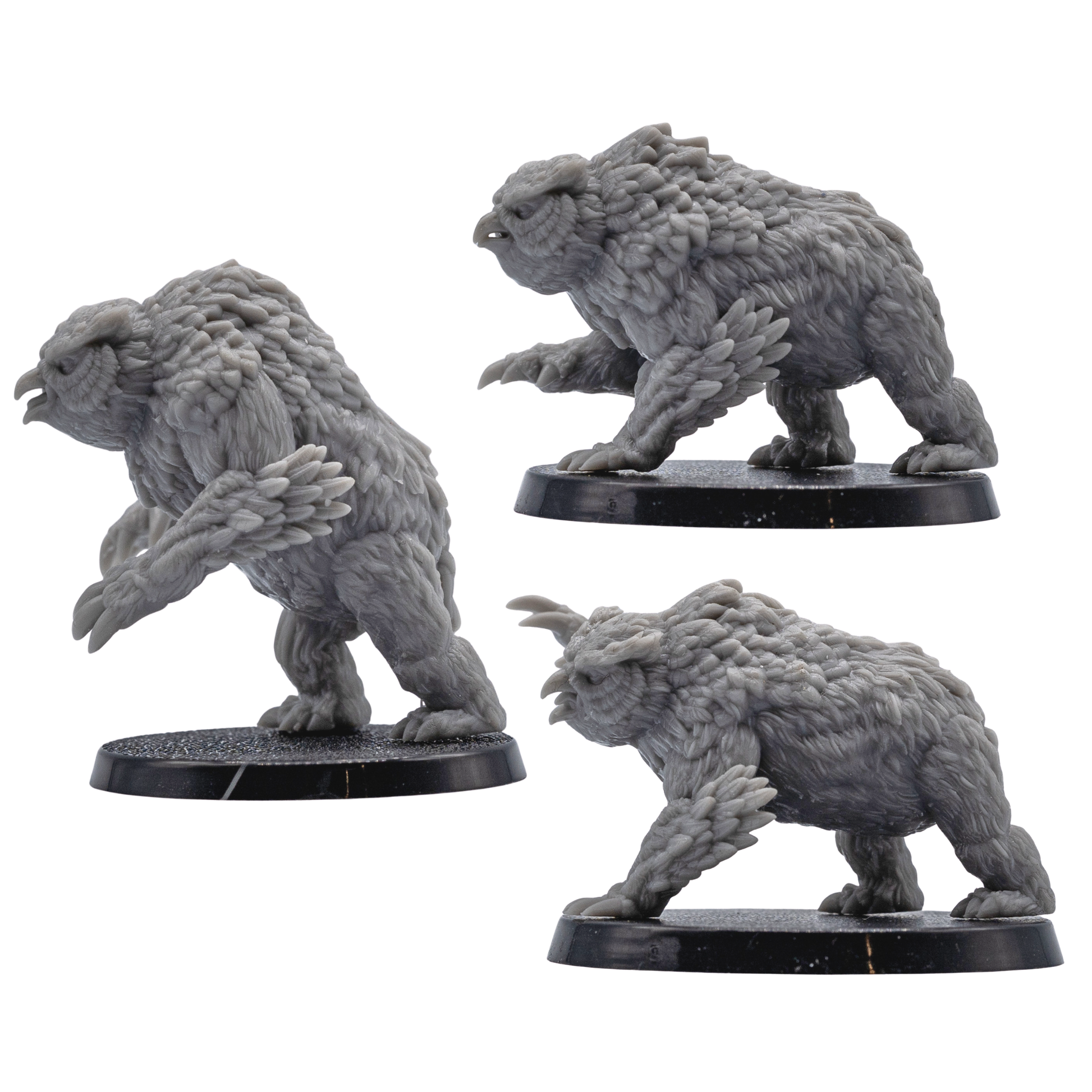 Profile views of three unpainted Owlbear miniatures by Forged Path Miniatures for fantasy tabletop encounters.