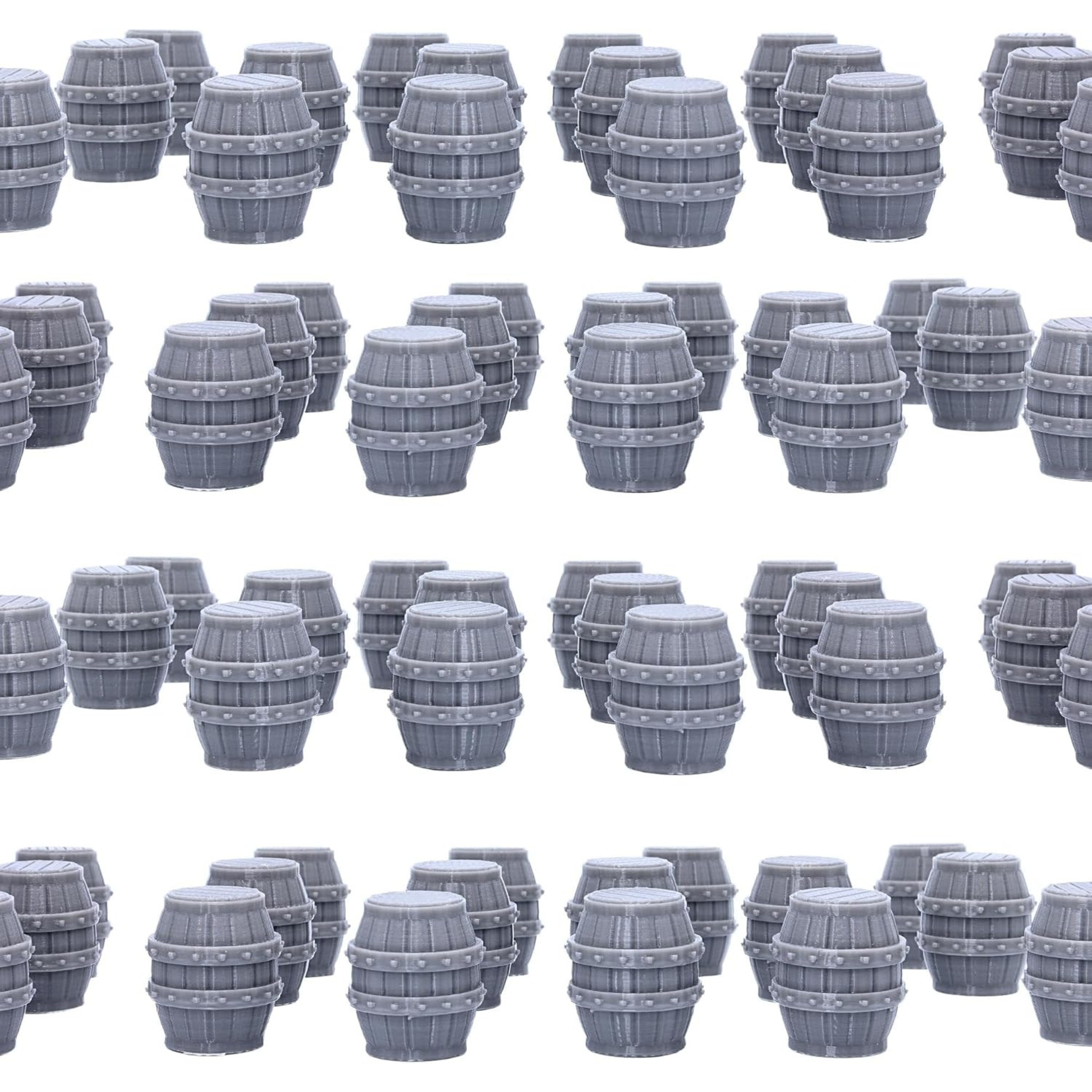 Multiple unpainted resin barrels arranged as tabletop scatter terrain
