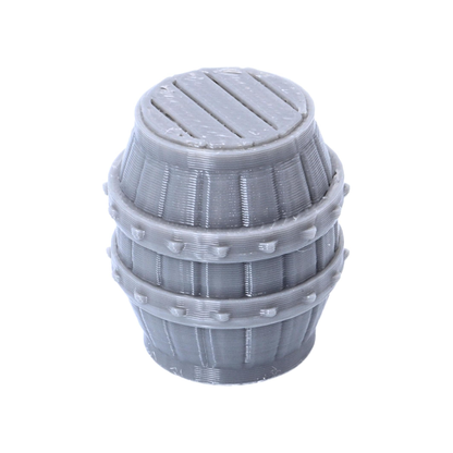 Angled close-up of an unpainted resin barrel terrain piece