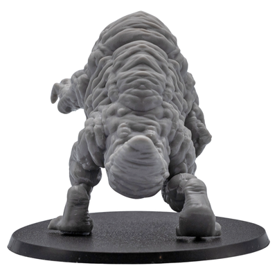 Side angle view of an unpainted Aberration monster miniature with exposed muscle-like sculpting, claws, eye cluster, and oval base.