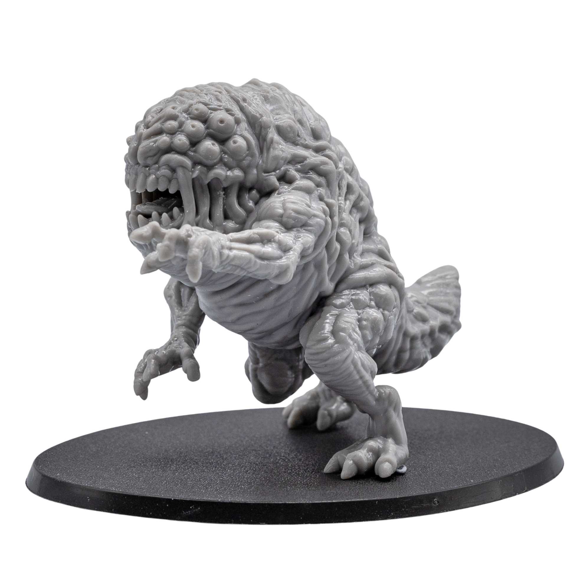 Side view of an unpainted Aberration resin miniature showing muscular body texture, extended claw, rear tail section, and oval base.