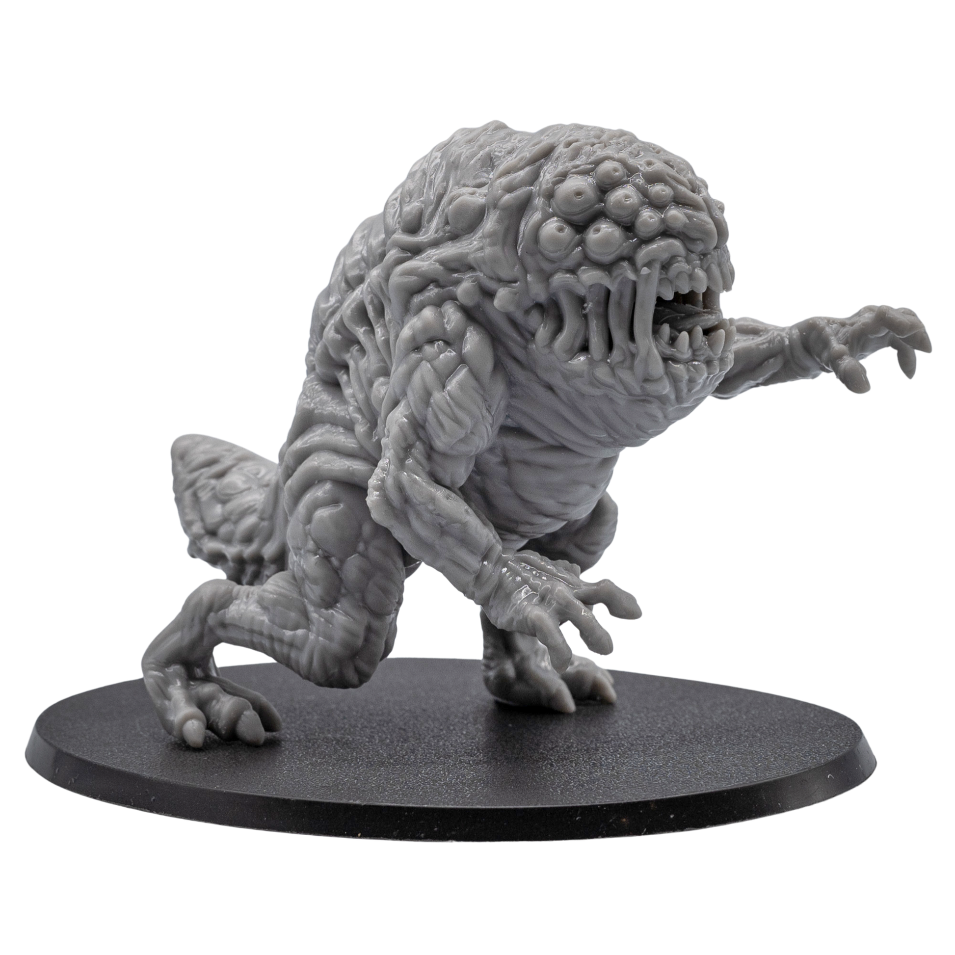 Three-quarter view of an unpainted Aberration fantasy miniature showing organic body texture, clawed limbs, and lunging pose.