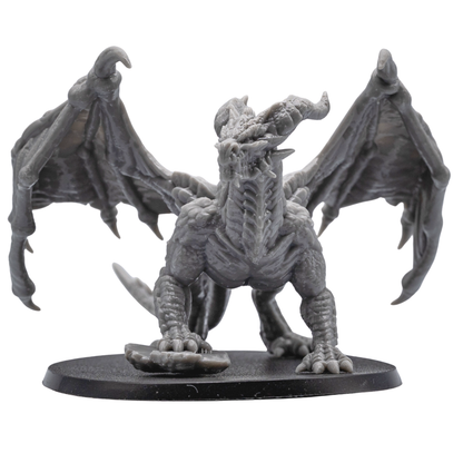 Unpainted Adult Red Dragon miniature front view showing wings, horns, scales, claws, and detailed dragon head.