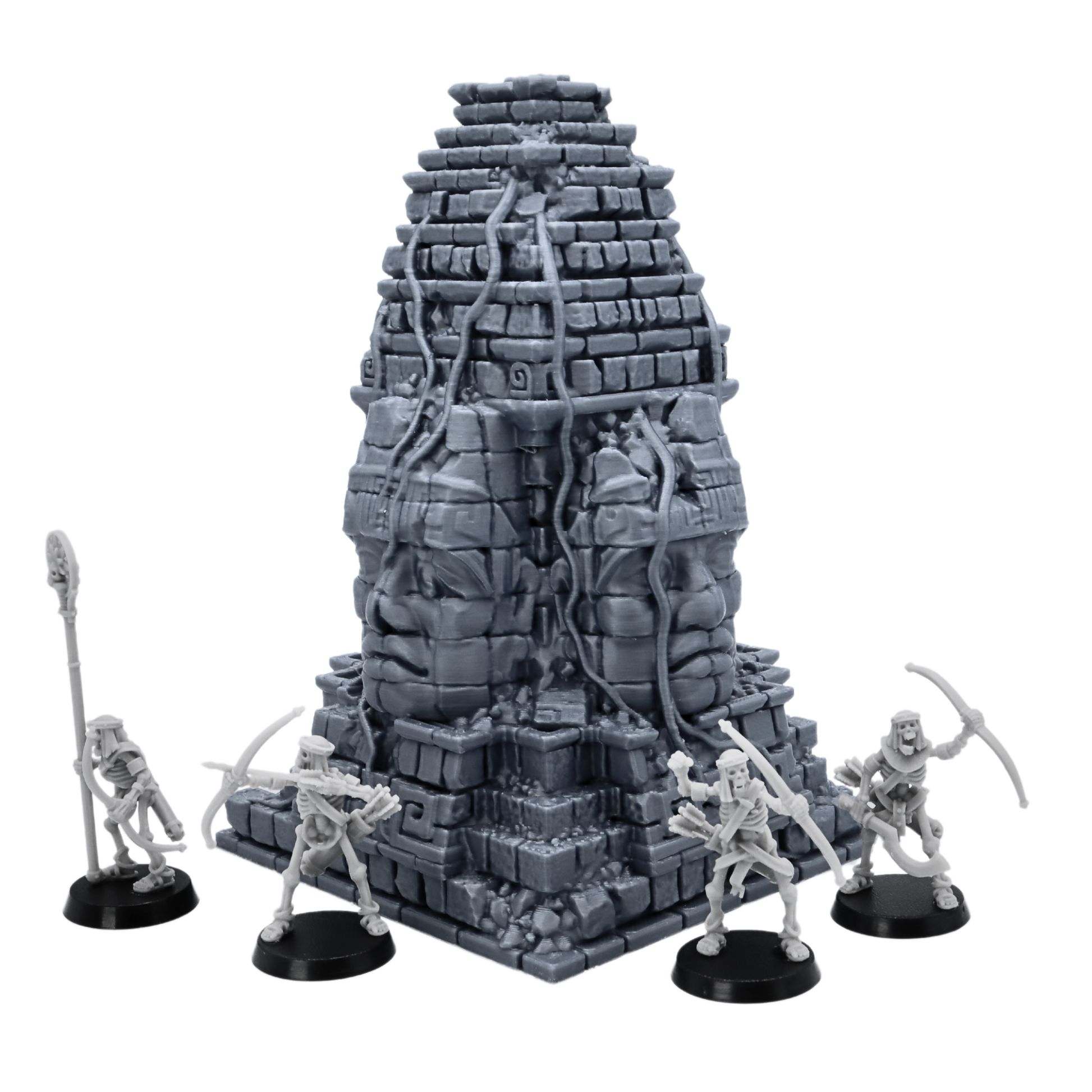 Unpainted Aztec Monument terrain shown with skeleton miniatures for tabletop scale reference.
