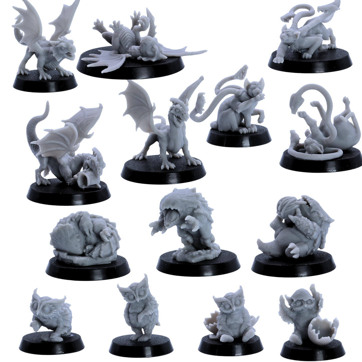 Unpainted Baby Dragons and Monsters miniature set showing front views of baby dragons, owlbears, bulettes, phase panthers, and wyrmlings.