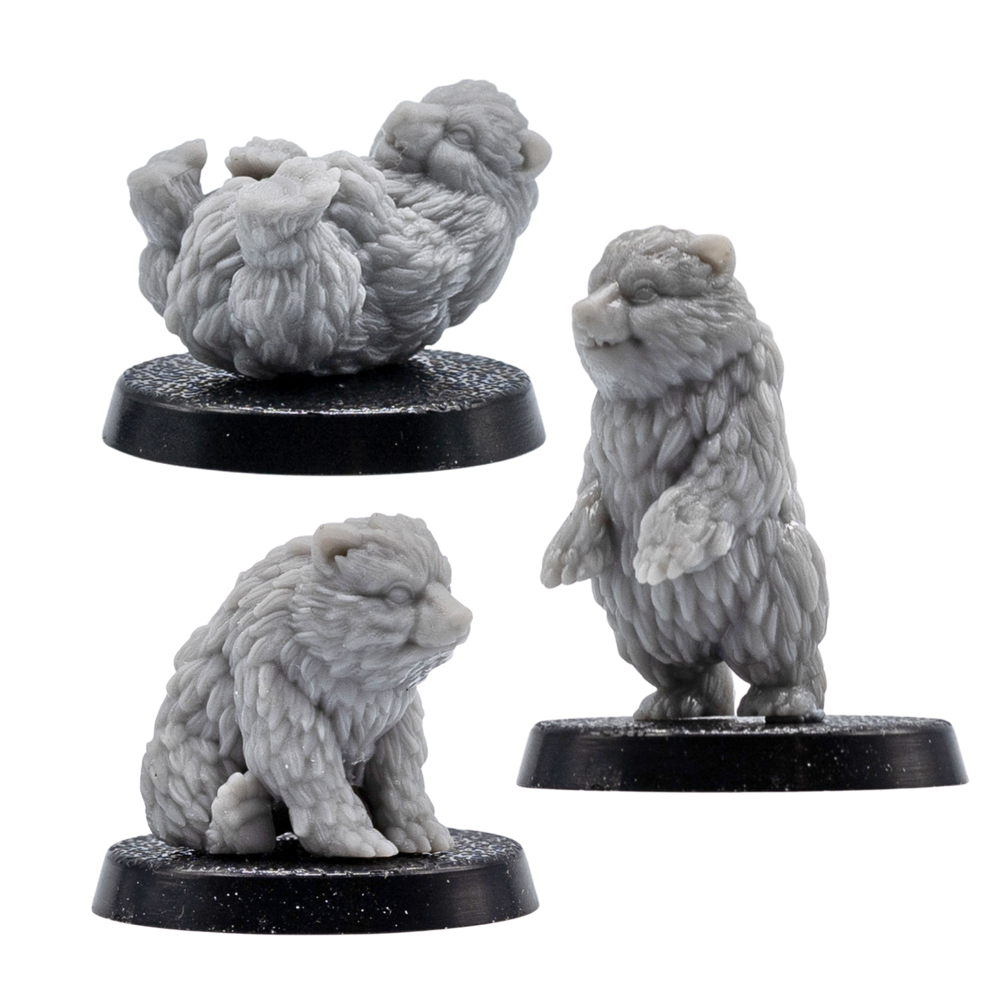 Unpainted Bear Cub Familiars showing three grey resin bear cub miniatures in seated, standing, and playful poses.