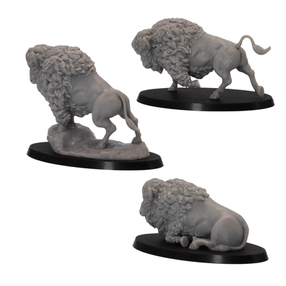 Rear view of three Bison miniatures showing detailed fur and different poses