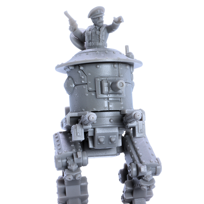 Close-up of the unpainted British MK1 Sentinel Heavy Tank miniature showing riveted armor, front cannon, and commander figure.