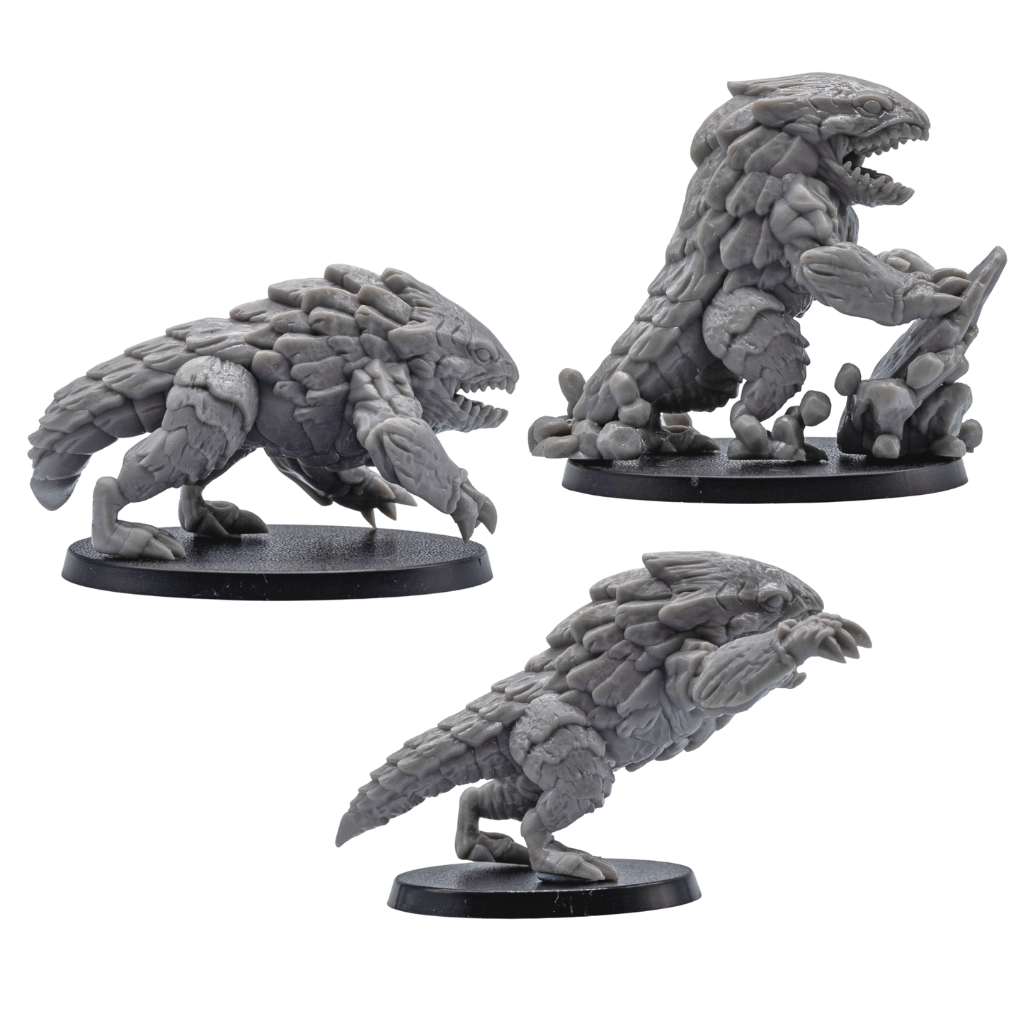 Profile views of unpainted Bulette fantasy creature miniatures with plated armor, claws, open mouths, and dynamic poses.