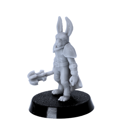 Unpainted bunny warrior miniature with axe and shoulder armor standing on a 25mm round base.