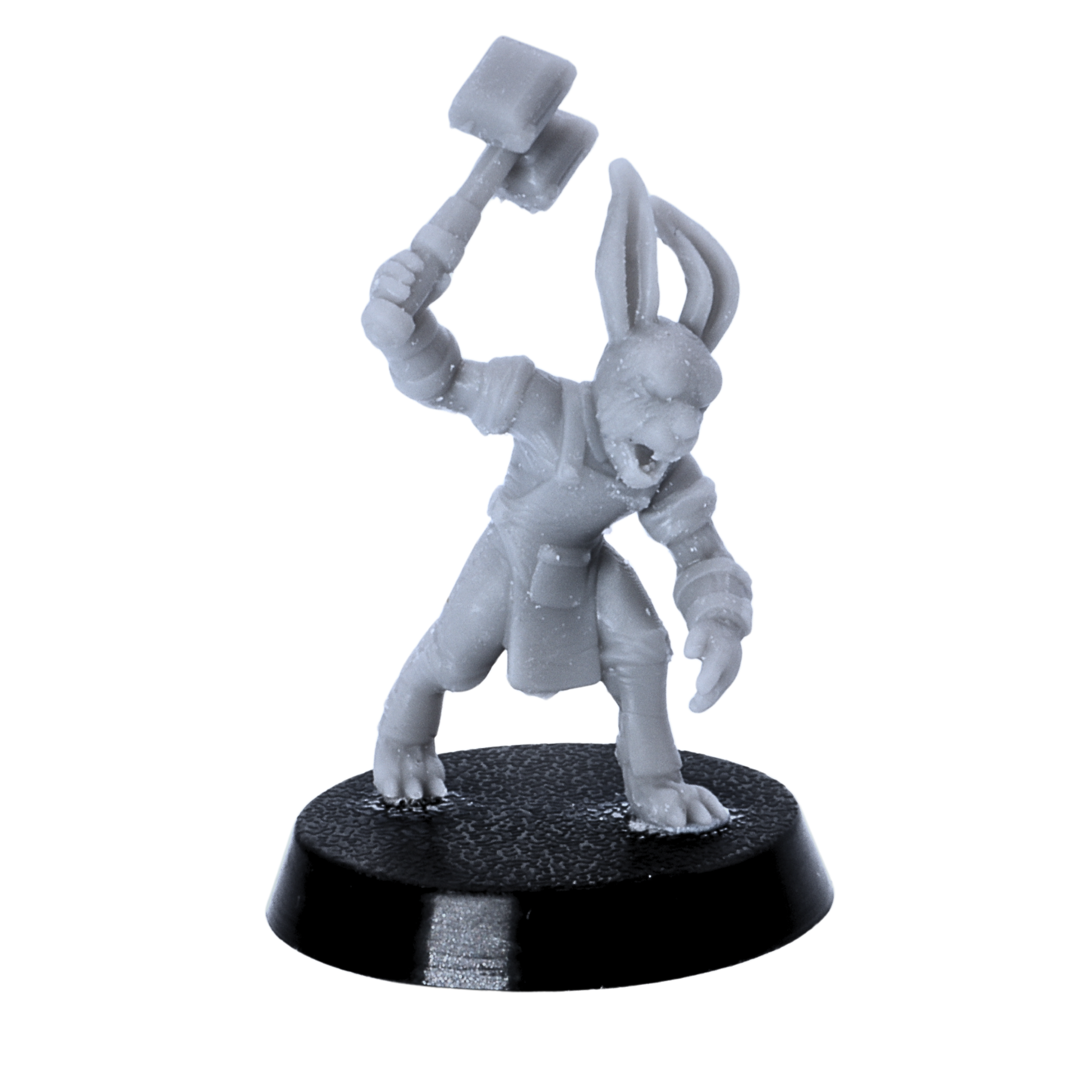 Unpainted bunny warrior miniature raising a hammer, wearing adventuring gear and standing on a round base.