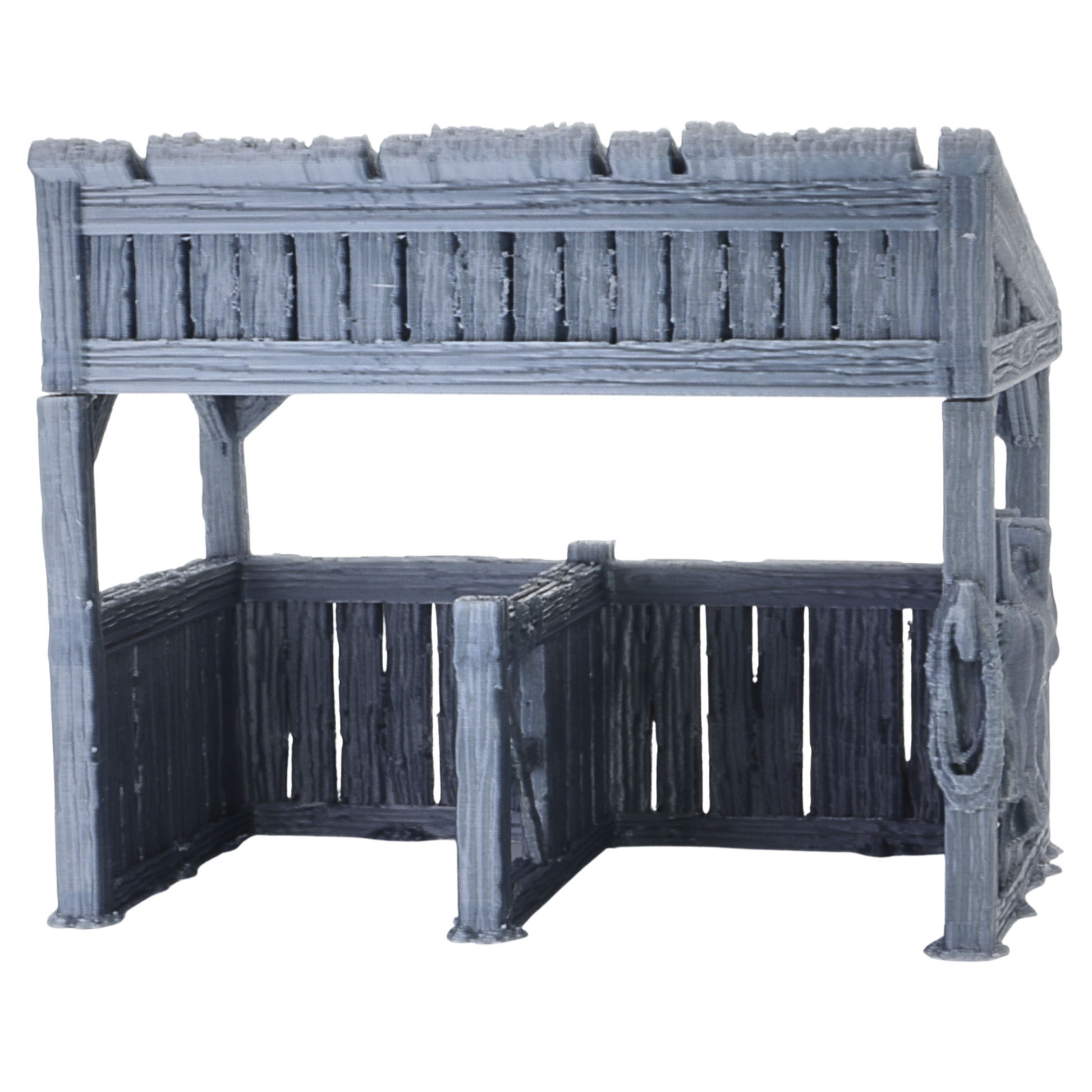 Front view of the Castle Stables terrain without loose accessories, showing open stable bays and detailed wooden wall texture.