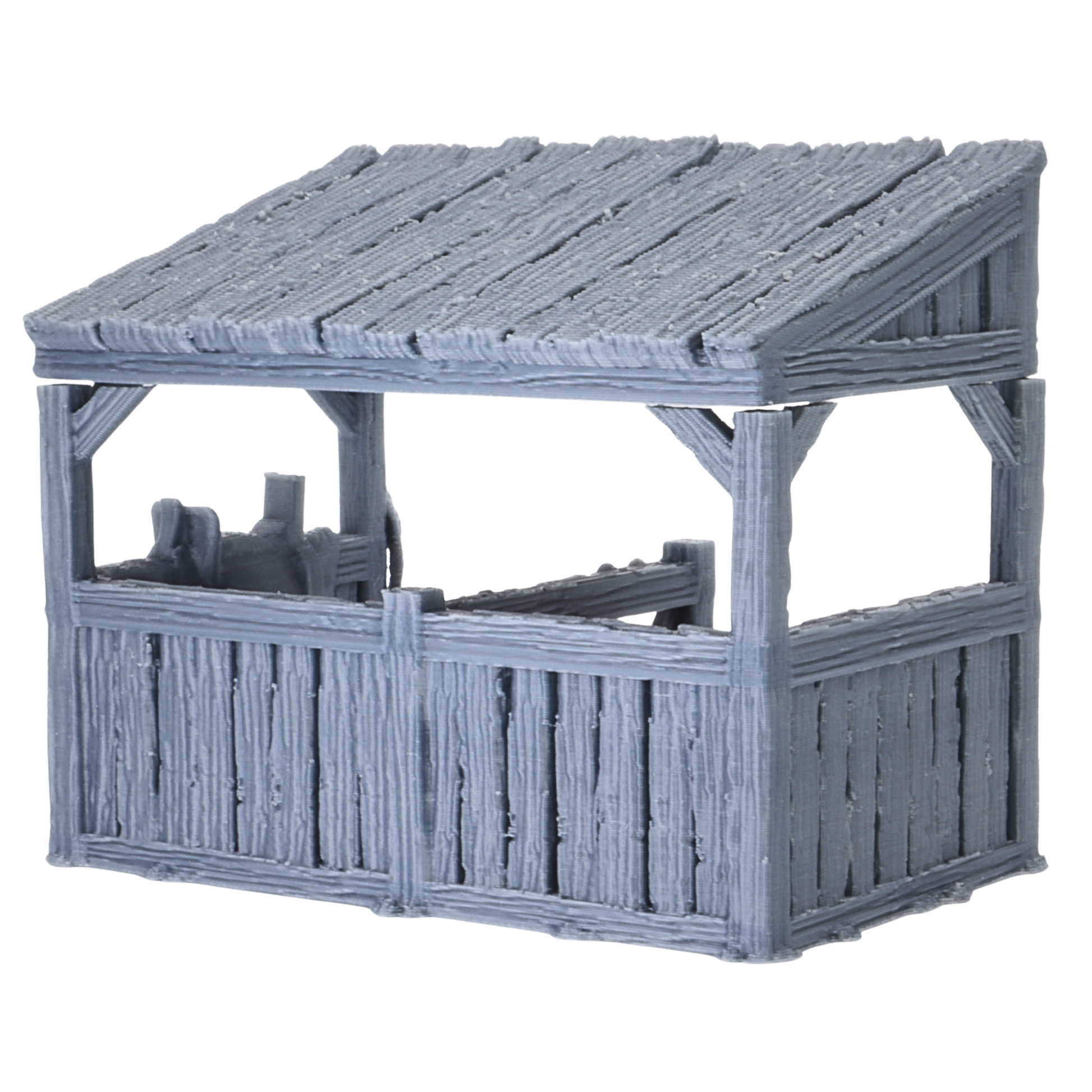 Rear angled view of unpainted Castle Stables terrain showing timber walls, open stable windows, and detailed roof texture.