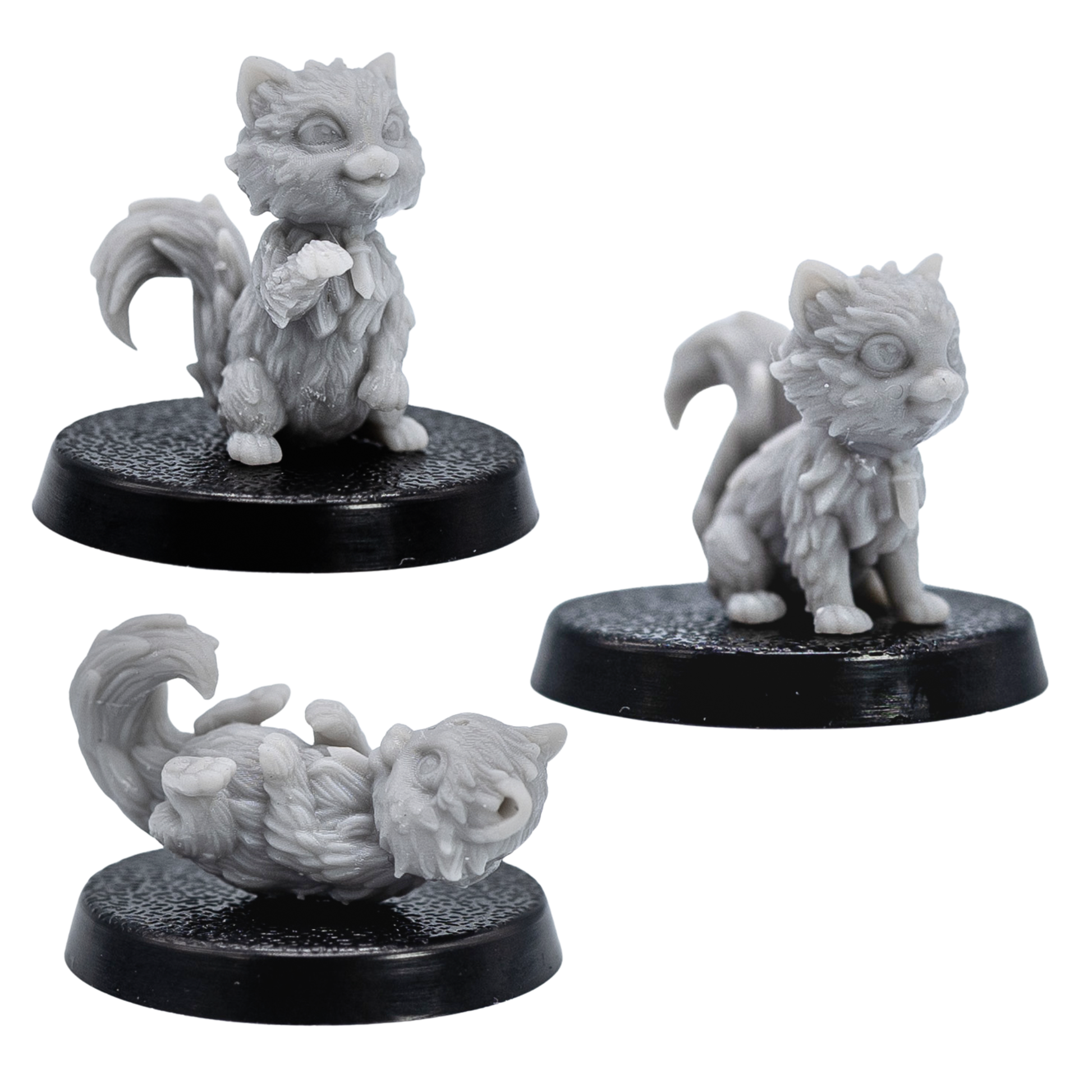 Unpainted Cat Familiars set showing three fluffy cat miniatures in different poses on round bases.