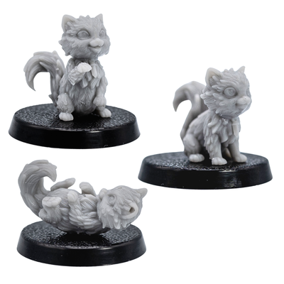 Unpainted Cat Familiars set showing three fluffy cat miniatures in different poses on round bases.