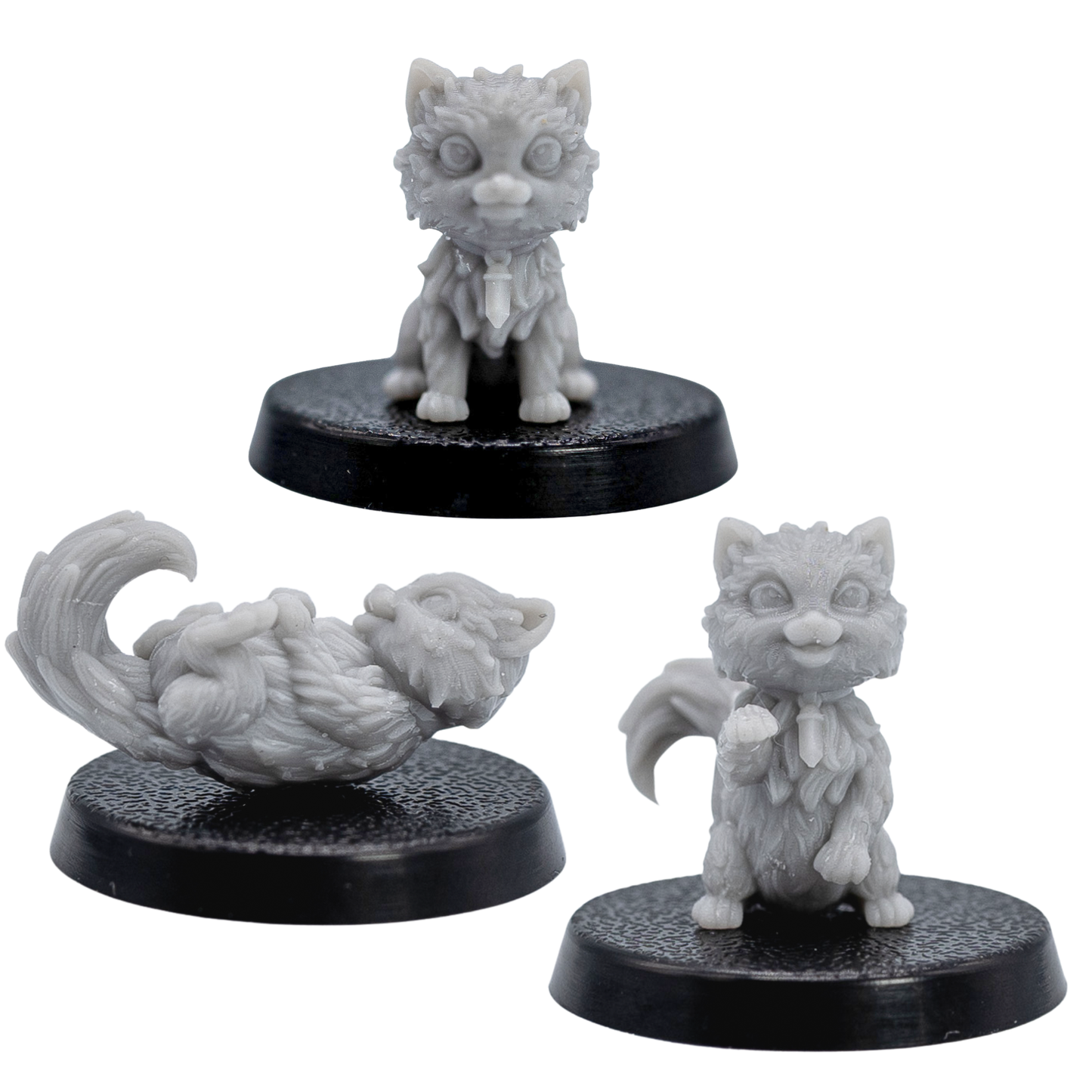 Unpainted Cat Familiars miniatures showing sitting, standing, and playful lying poses.