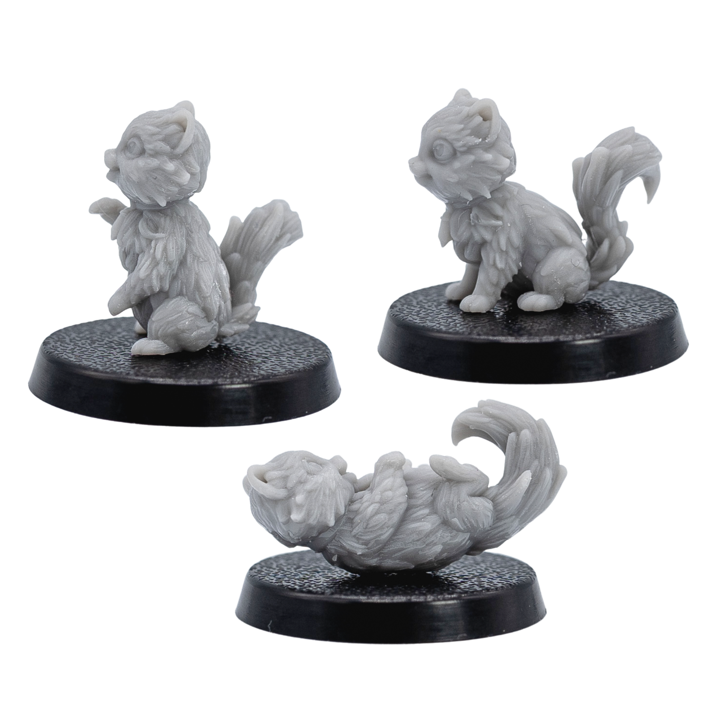Side views of the unpainted Cat Familiars miniatures by Forged Path Miniatures on 25mm bases.