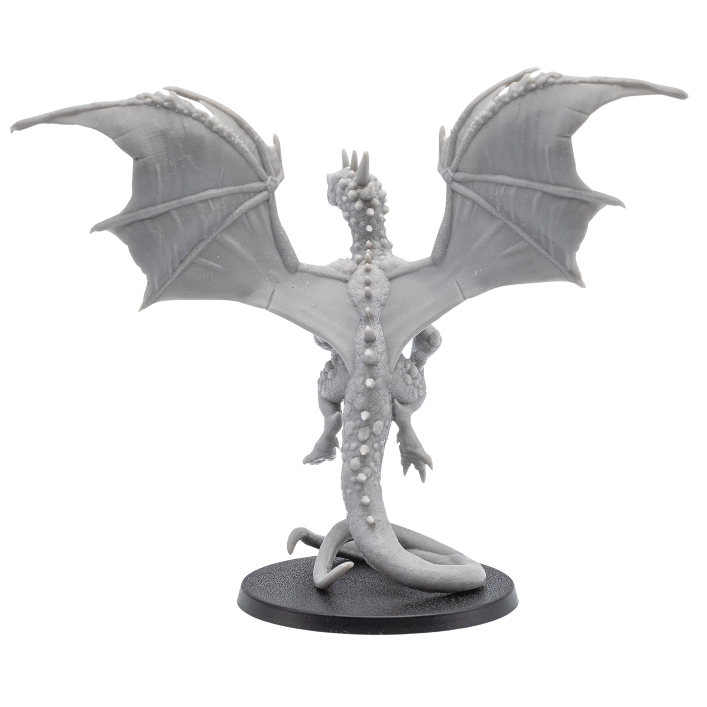 Back angle view of the Crystal Dragon miniature showing wide wings, long tail, crystal-like back details, and rear sculpting.