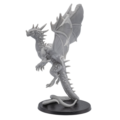 Left side view of an unpainted Crystal Dragon resin miniature showing wings, claws, crystal body details, and curled tail on a round base.