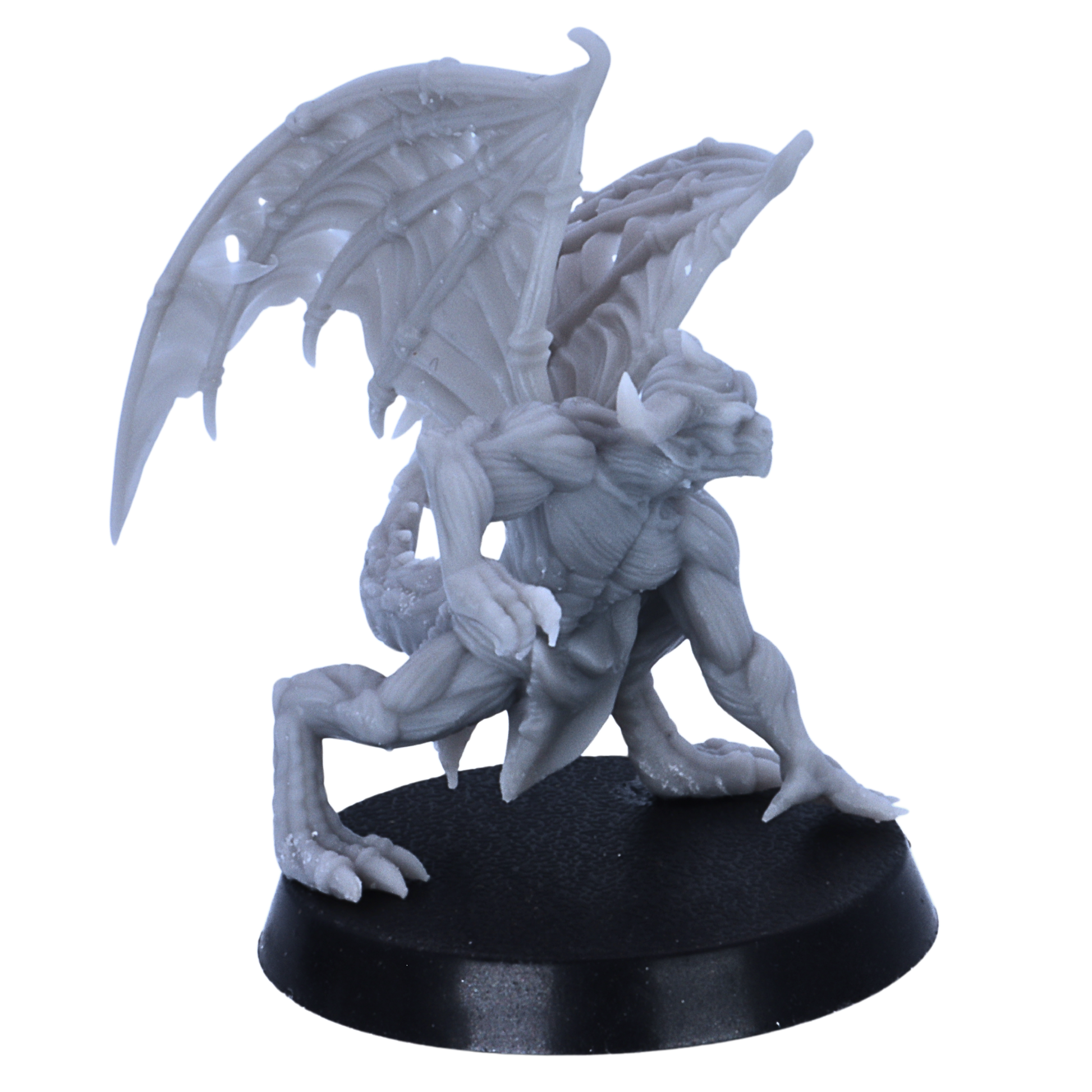 Close-up of an unpainted crouching Devil Minion miniature with spread wings, horns, claws, and tail.