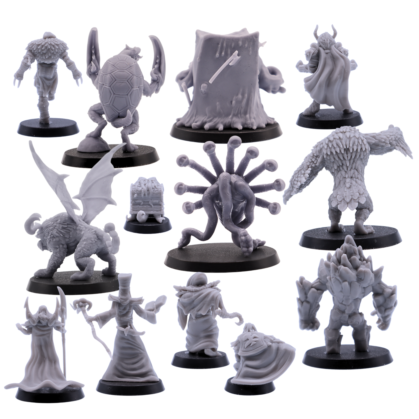 Rear views of unpainted DnD Monster Starter Set miniatures showing assorted fantasy monsters, villains, creatures, and dungeon enemies.