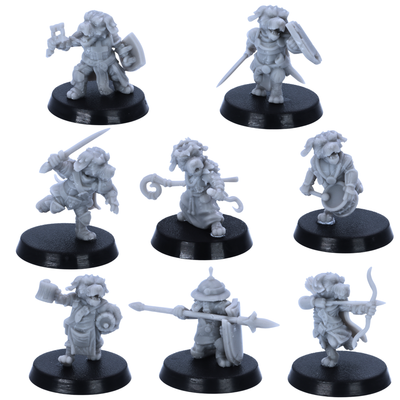 Unpainted Dog Folk miniatures showing eight fantasy canine adventurers with weapons, shields, bow, spear, drum, and robes.