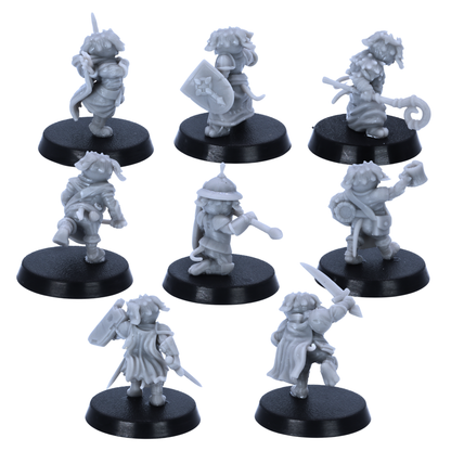 Unpainted Dog Folk miniatures showing rear views with cloaks, shields, tails, weapons, armour, and adventuring gear.