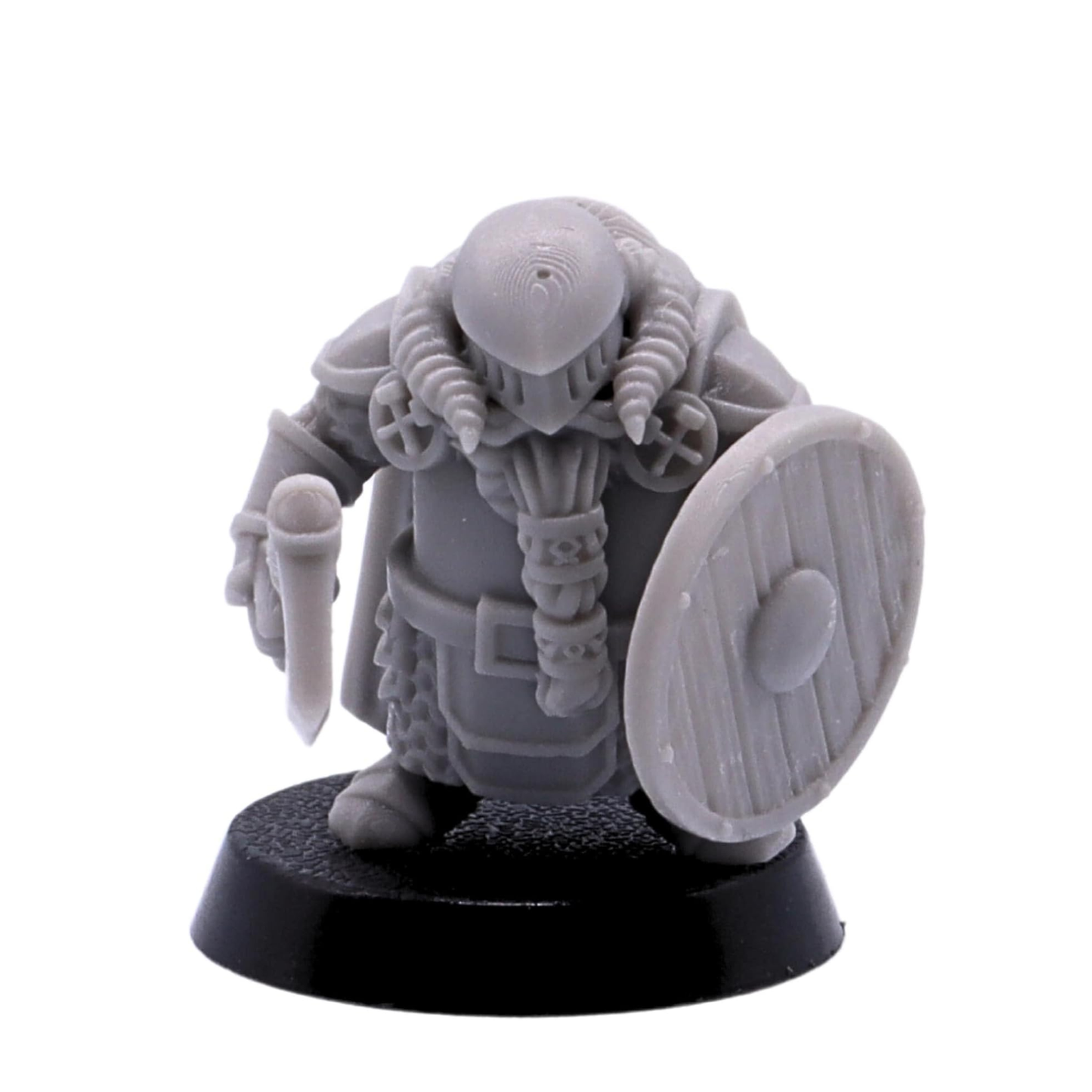 Unpainted helmeted dwarf warrior miniature with axe and shield on a 25mm round base.