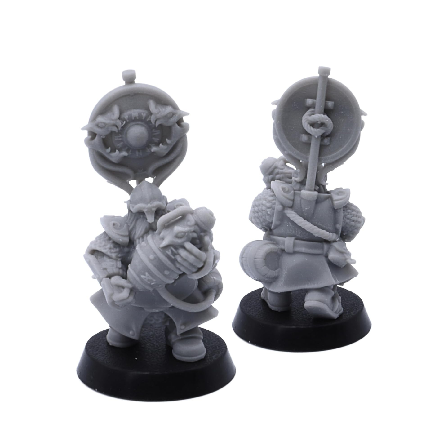 Unpainted Dwarf Fire Spitters banner miniature with shield and powder keg details shown from multiple angles.