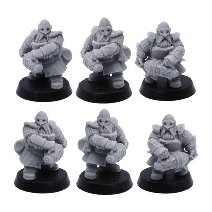 Unpainted dwarf cannon crew miniatures from the Dwarf Fire Spitters set shown in repeated front views.