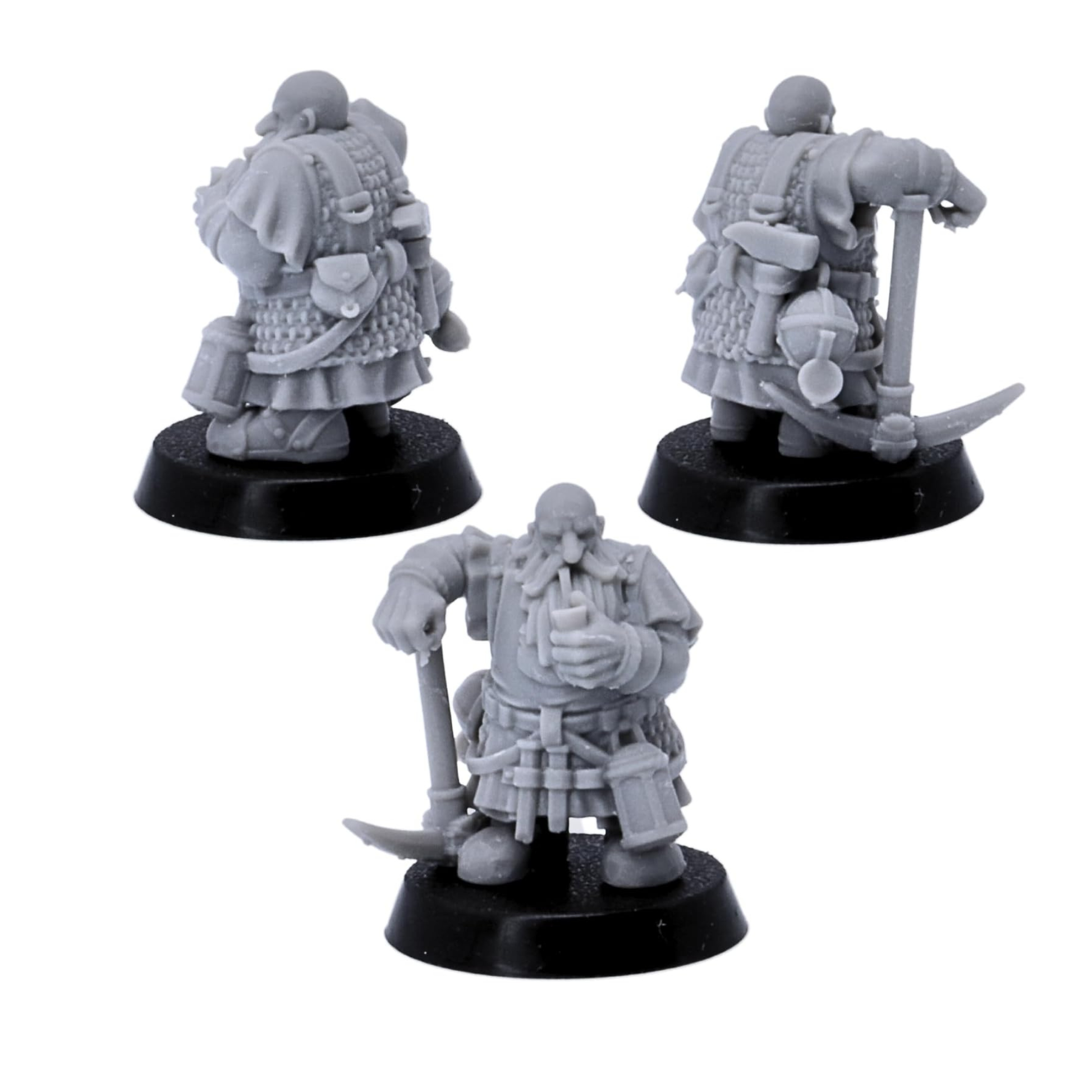 Rear views of unpainted dwarf miner miniatures showing armour, tools, belts, and mining equipment.