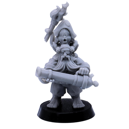 Unpainted dwarf pirate captain miniature with cannon and dramatic hat detail shown close up.