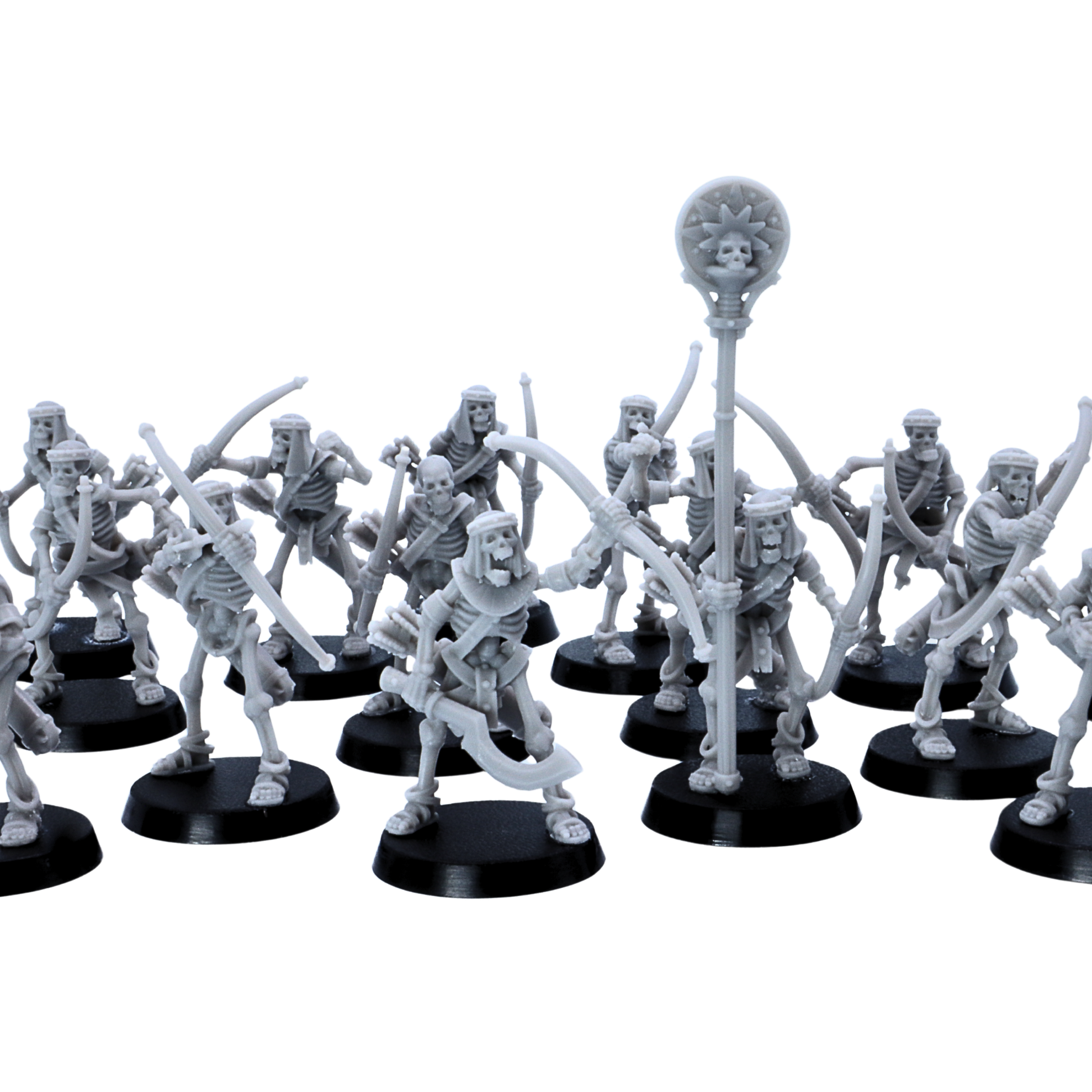 Rear ranked display of Egyptian Skeleton Bowmen miniatures showing bows, quivers, command standard, skeletal poses, and 25mm round bases.