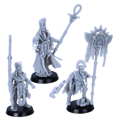 Front view of the three Egyptian Skeleton characters with ornate headdresses, weapons and ceremonial equipment.
