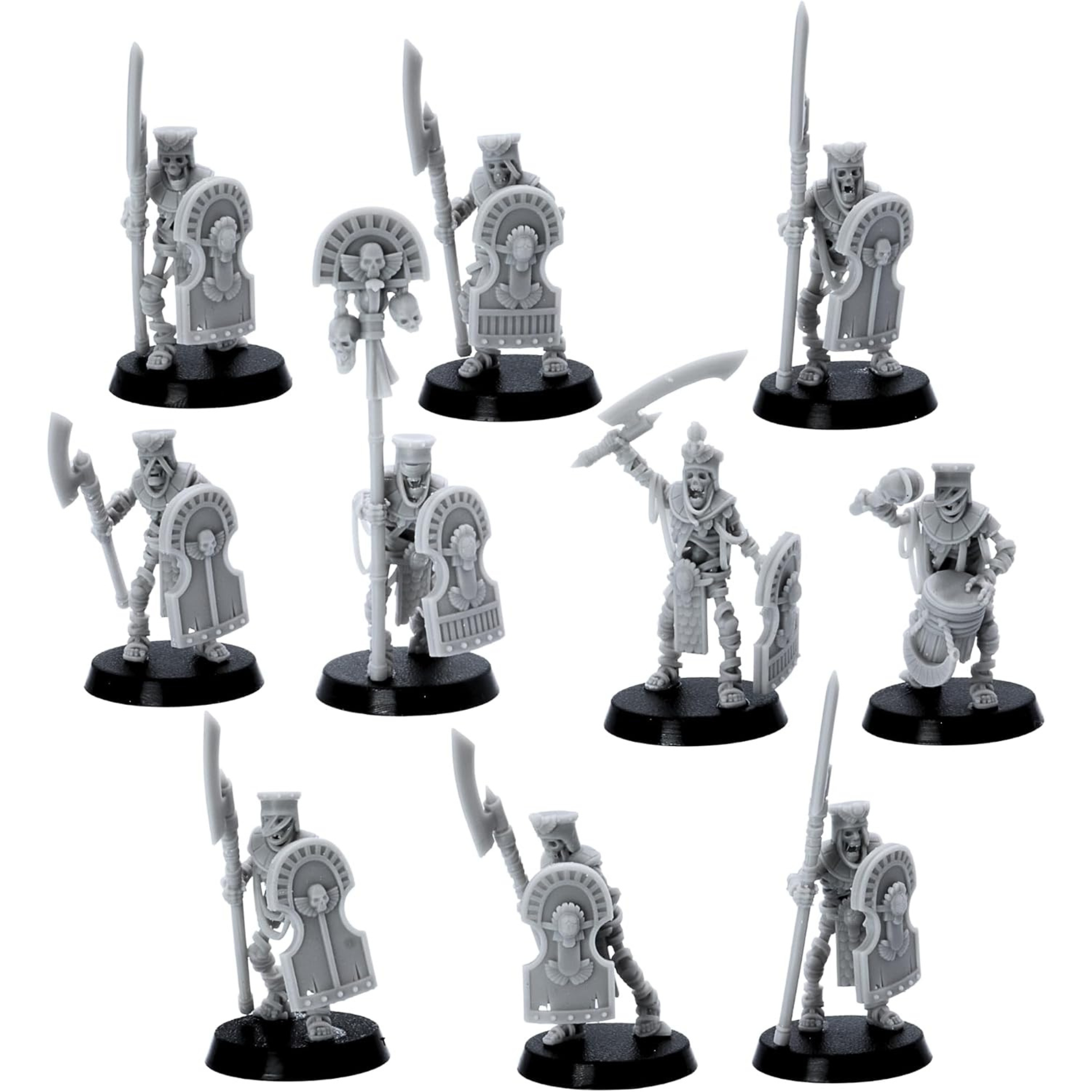 Front view of Egyptian Skeleton Kings Guard miniatures with ornate shields, polearms, banner and drummer.