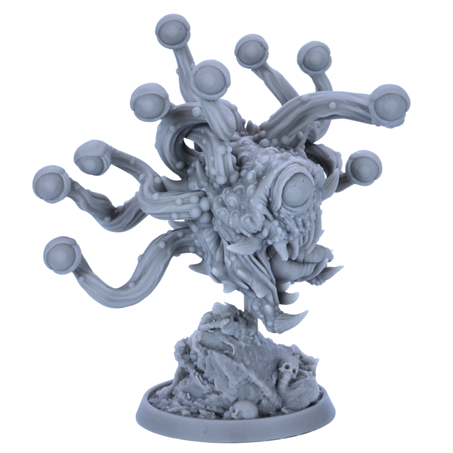 Unpainted Eye Tyrant miniature showing side view with multiple eye stalks, floating body, and skull-strewn scenic base.