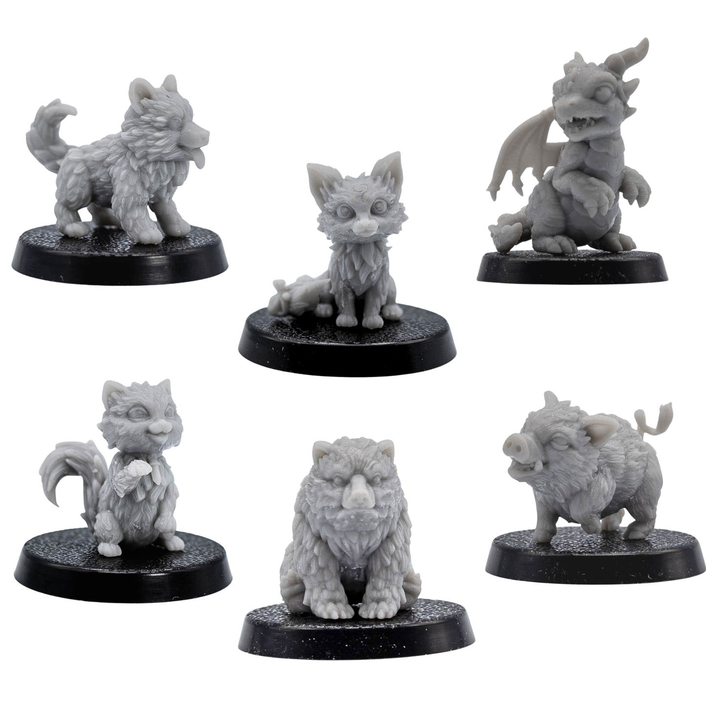Unpainted set of six Fantasy Familiars showing the puppy, fox, cat, baby boar, bear cub, and wyrmling.