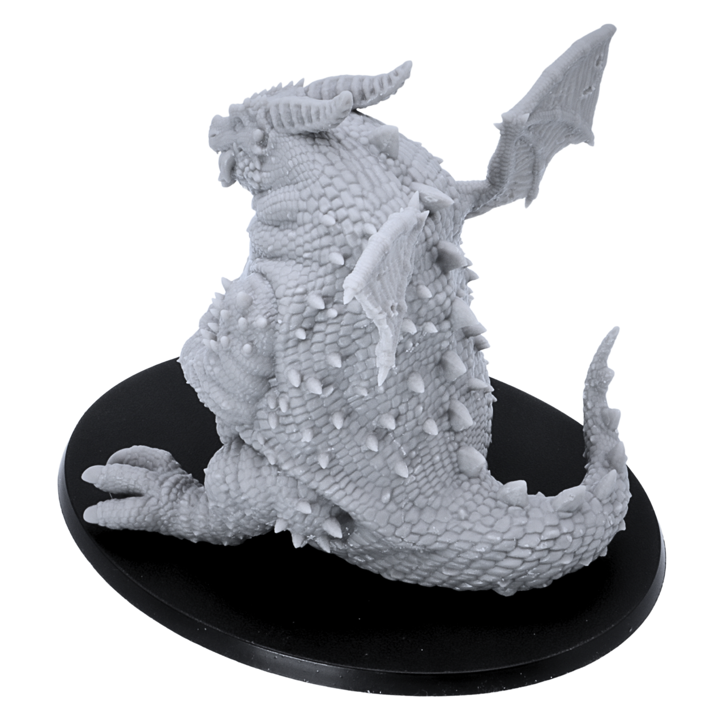 Rear view of the Fat Dragon Sitting miniature showing tail, wings, back scales, and spikes.