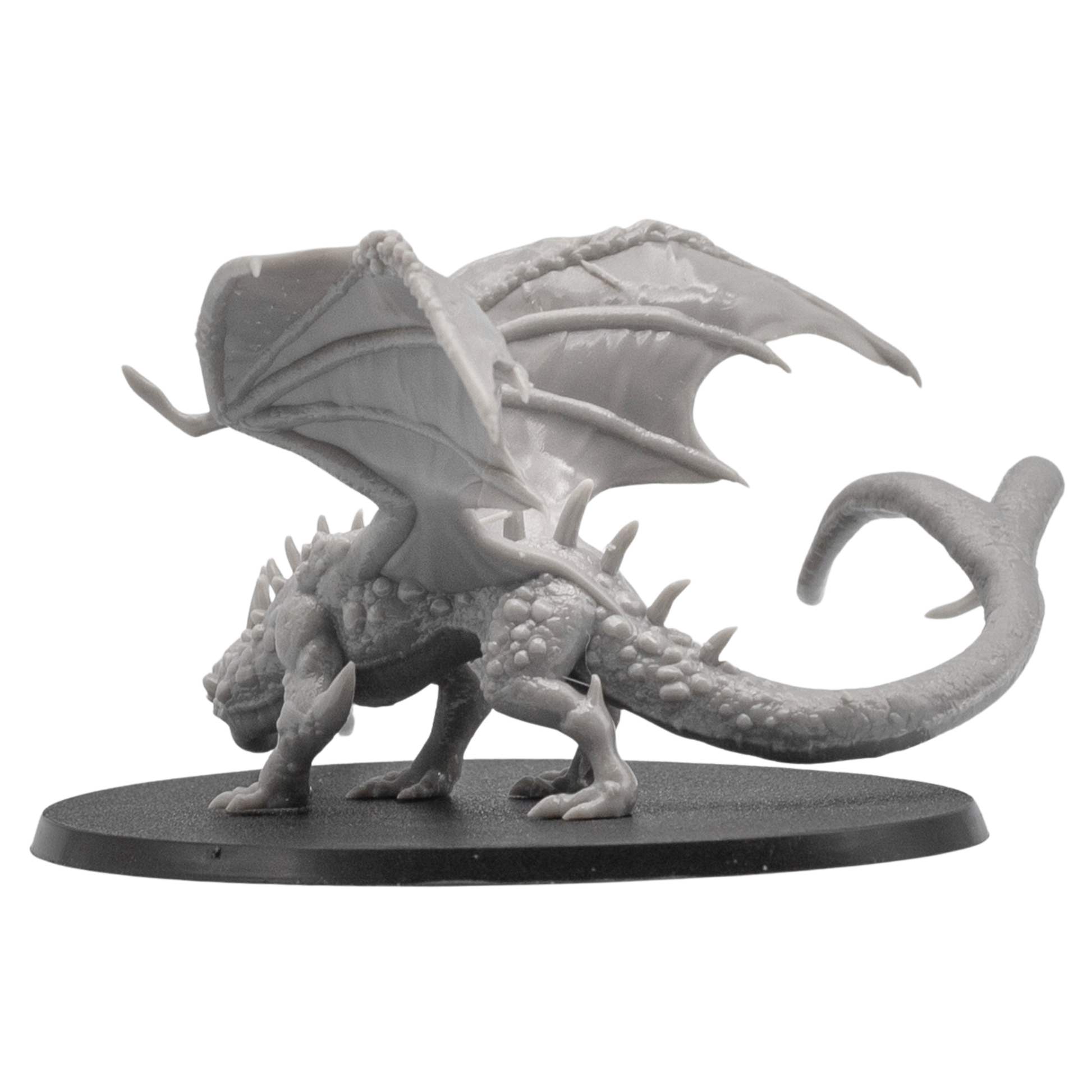 Left side view of an unpainted Fire Breathing Crystal Dragon miniature with folded wing detail, crystal body texture, flame breath, and oval base.