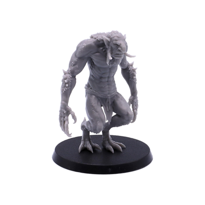 Forest Troll miniature with long arms, tusks and a hunched stalking pose.