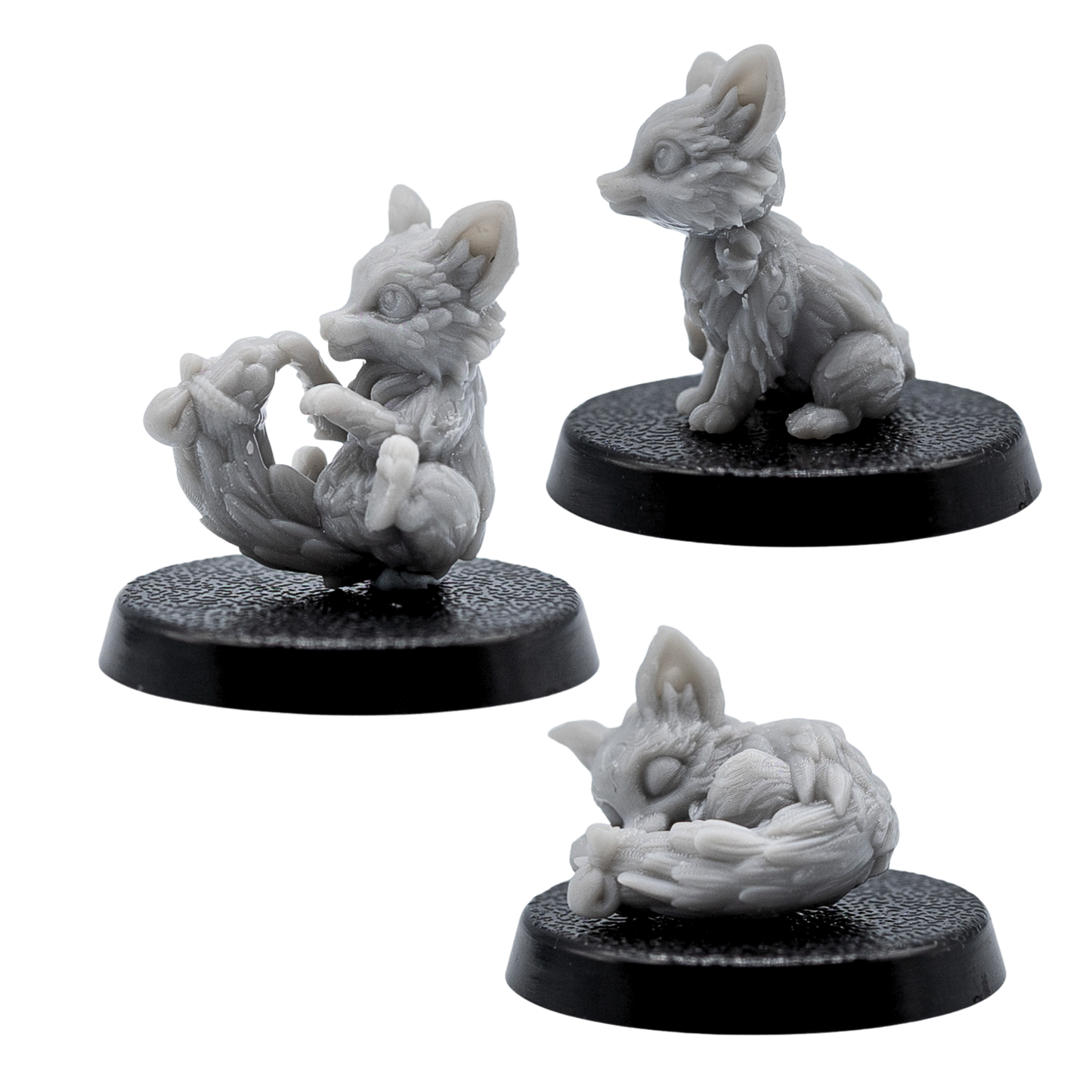 Side views of the unpainted Fox Familiars miniatures by Forged Path Miniatures on 25mm bases.