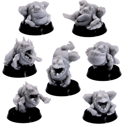Fantasy frog miniatures shown in multiple poses with large mouths, tongues and amphibian features.