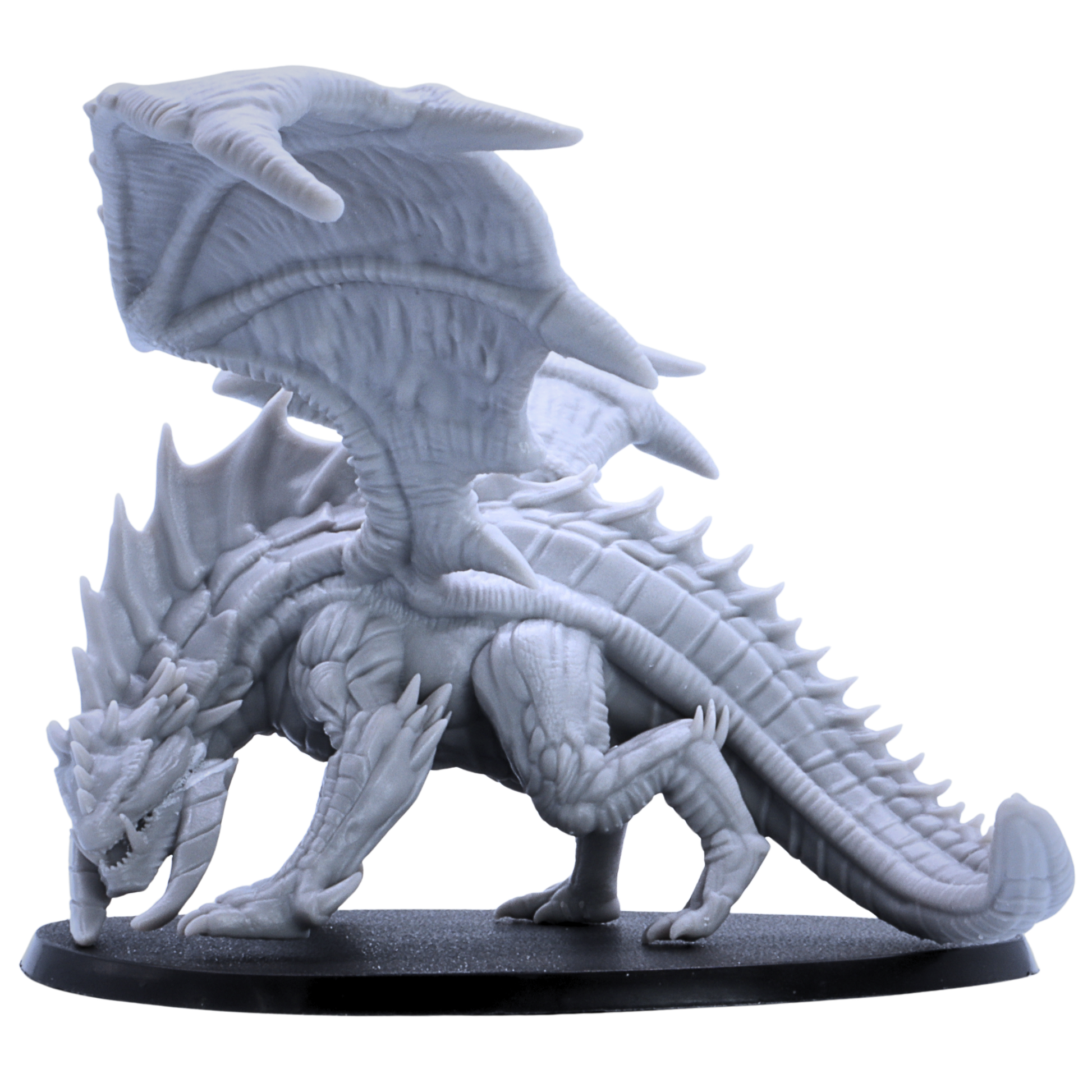 Side view of unpainted Giant Red Dragon miniature on large oval base with folded stance and detailed wings.